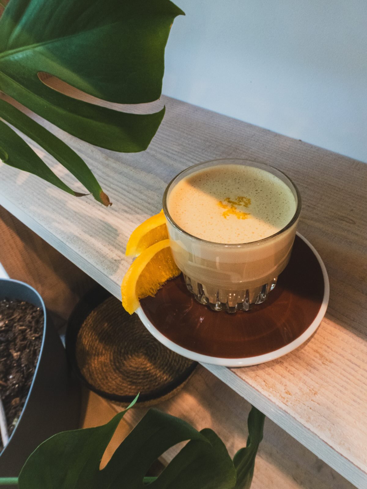 Orange yuzu latte with orange slices